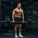Muscular Man Lifting Heavy Barbell in Gym