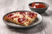 Pepperoni Pizza Slice on a Gray Plate