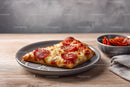 Slice of Pepperoni Pizza on a Grey Plate