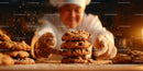 Pastry Chef Arranging Freshly Baked Chocolate Chip Cookies