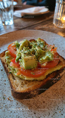 Avocado Toast with Tomato and Herbs on Rustic Plate