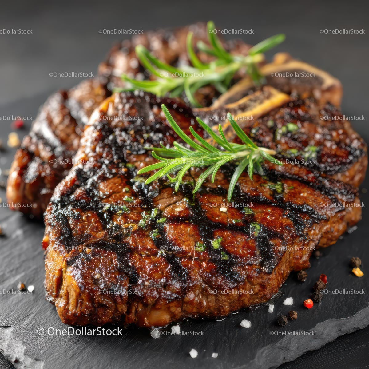 Juicy Grilled Steak Garnished with Fresh Rosemary