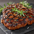 Grilled Steak with Rosemary on Black Slate