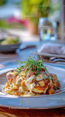 Gourmet Chicken Dish with Creamy Sauce and Microgreens
