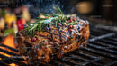 Juicy Grilled Steak with Rosemary on Flame Grill