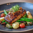Gourmet Roasted Salmon with Vegetables and Microgreens