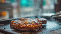 Juicy Grilled Steak on a Sizzling Hot Plate