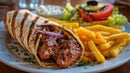Grilled Meat Wrap with Fries and Fresh Greek Salad