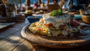 Creamy Pasta Dish with Herbs on Wooden Plate
