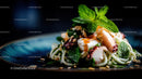 Gourmet Seafood Pasta Garnished with Fresh Mint