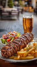 Grilled Skewer with Salad and Beer on a Pub Table