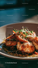 Gourmet Shrimp Dish with Crispy Bread and Microgreens