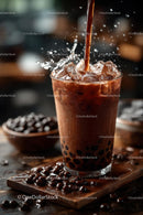 Iced Coffee with Splashes and Ice Cubes on Dark Background