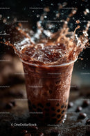Iced Coffee with Splashes and Ice Cubes on Dark Background