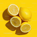 Fresh Lemons on a Bright Yellow Background
