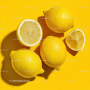 Fresh Lemons on a Bright Yellow Background