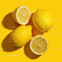 Fresh Lemons on a Bright Yellow Background