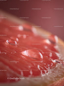 Macro Shot of Fresh Red Grapefruit Slice with Water Droplets