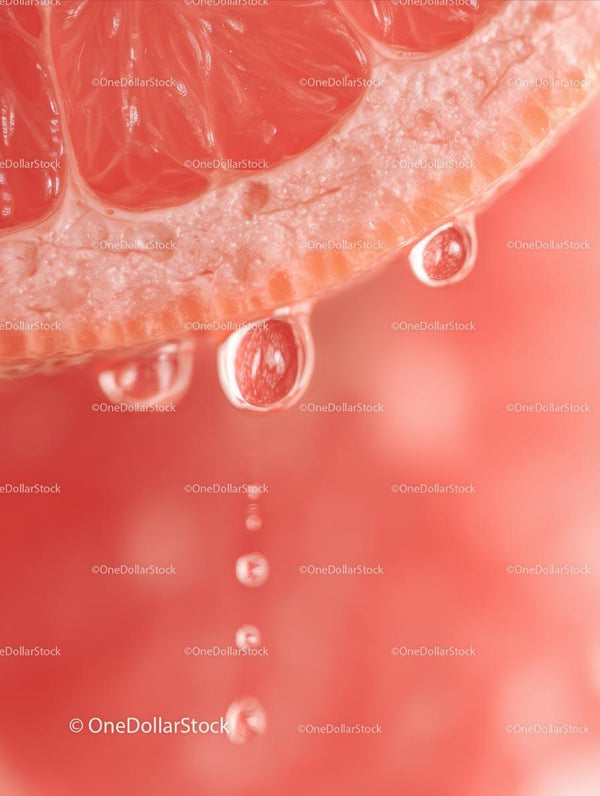 Refreshing Grapefruit Slice with Water Droplets