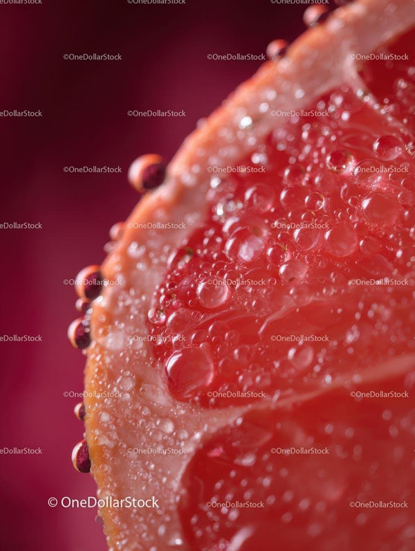 Macro Close-Up of Juicy Red Grapefruit Slice