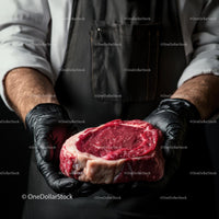 Butcher Holding Fresh Ribeye Steak in Gloved Hands
