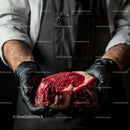 Butcher Holding Fresh Raw Beef Steak
