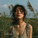 Young Woman in a Summer Field