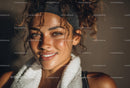 Sunlit Woman with Towel Embracing Fitness and Wellness