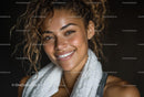 Smiling Woman with Towel Embracing Wellness Lifestyle