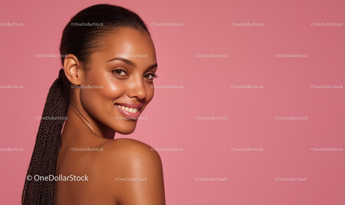 Smiling Confident Woman with Crown Braid on Pink Hue