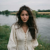 Young Woman in a Light Summer Dress by the Riverside