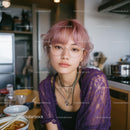 Trendy Young Woman with Pink Hair in Modern Kitchen