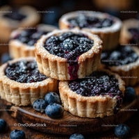 Delicious Blueberry Tarts on a Rustic Wooden Board
