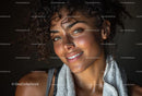 Smiling Woman with Curly Hair and Athletic Glow