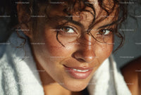 Sunlit Portrait of Smiling Woman with Curly Hair and Freckles