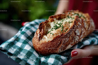 Crusty Bread Loaf with Chives on Checkered Cloth