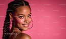 Smiling Woman with Braided Hair on Pink Background