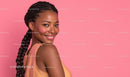 Smiling Woman in Elegant Dress on Pink Background