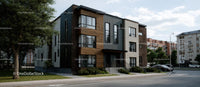 Modern Apartment Building on Tree-lined Street