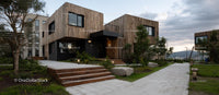 Modern Wooden Houses with Stylish Green Landscaping