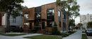 Contemporary Townhouse with Wooden Facade in Urban Setting