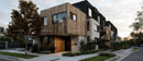 Modern Townhouse with Wooden Facade in Suburban Setting