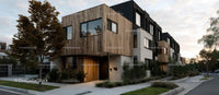 Modern Townhouse with Wooden Facade in Suburban Setting