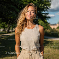 Smiling Blonde Woman in Casual Attire on a Sunny Day