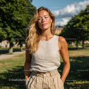 Smiling Woman in Linen Outfit on a Sunny Day