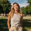 Relaxed Young Woman Enjoying the Sunny Day in the Park