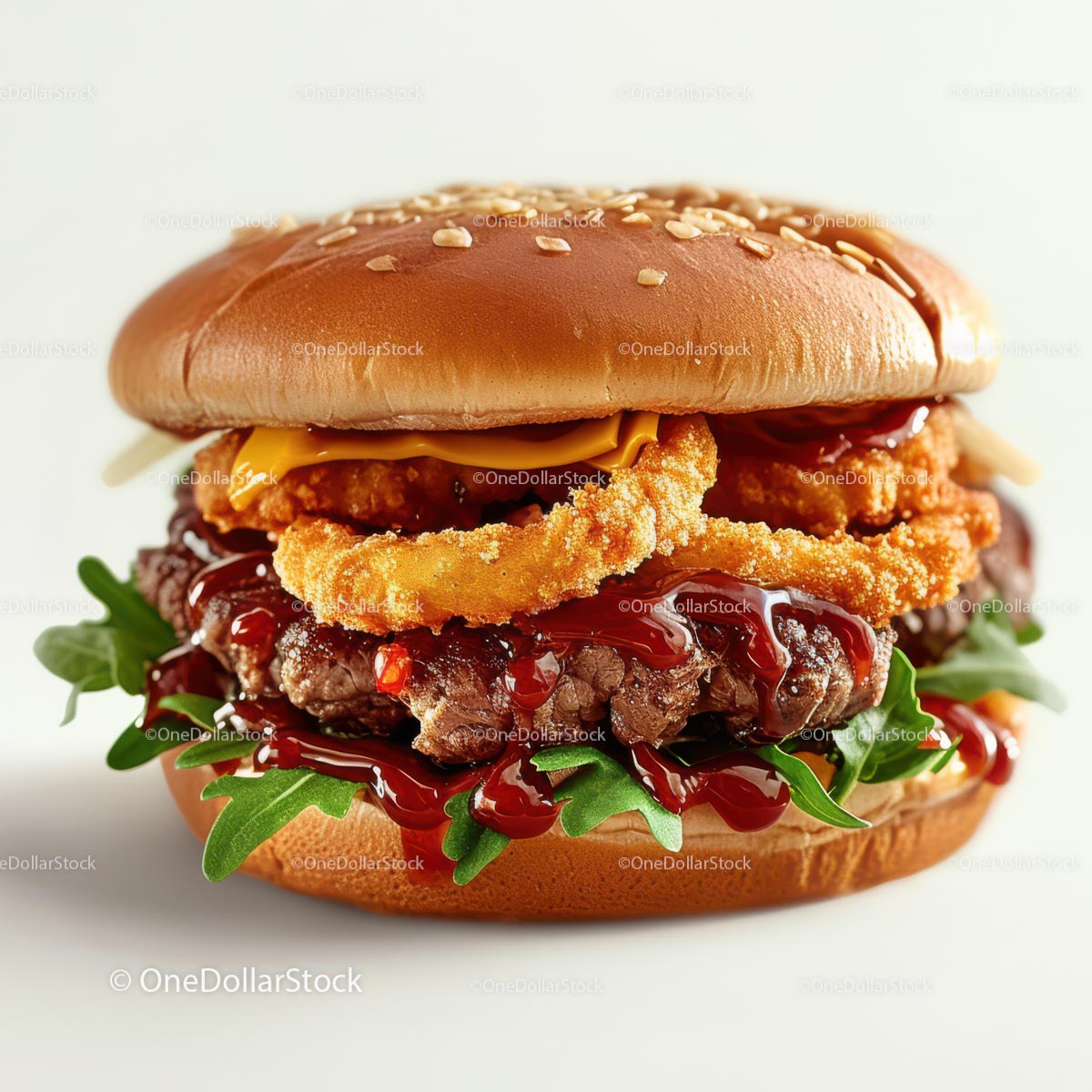 Gourmet Burger with Crispy Onion Rings and Arugula