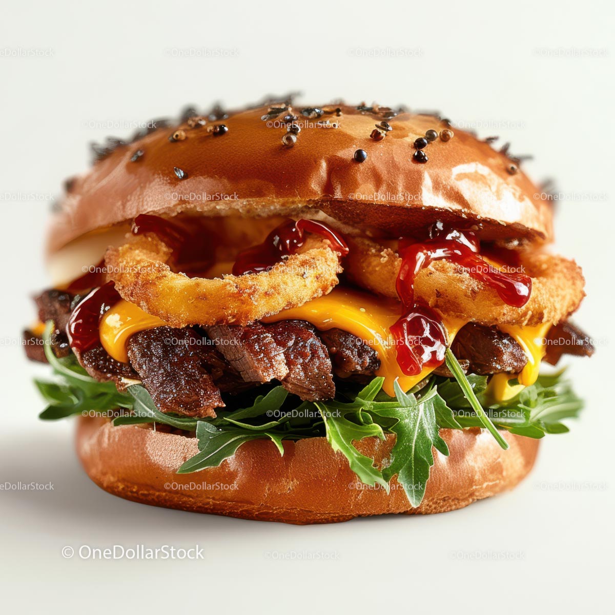 Pyszny burger gourmet z krążkami cebulowymi i serem