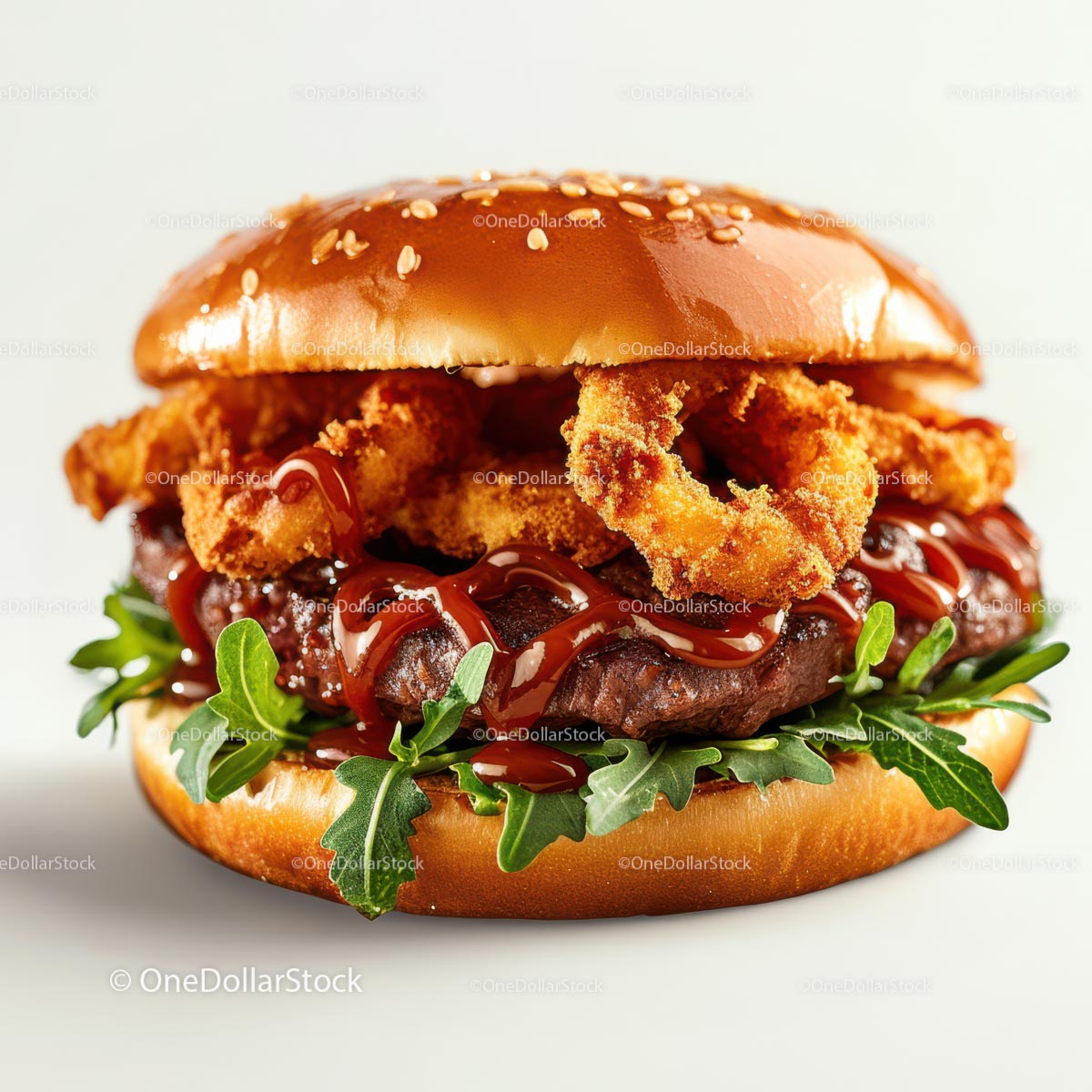 Gourmet Burger with Onion Rings and Arugula