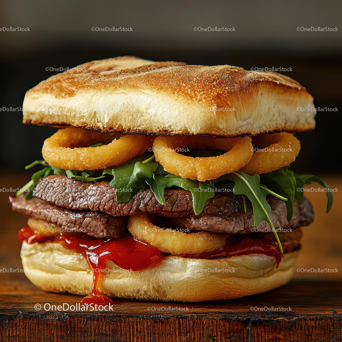 Gourmet Burger with Onion Rings and Arugula